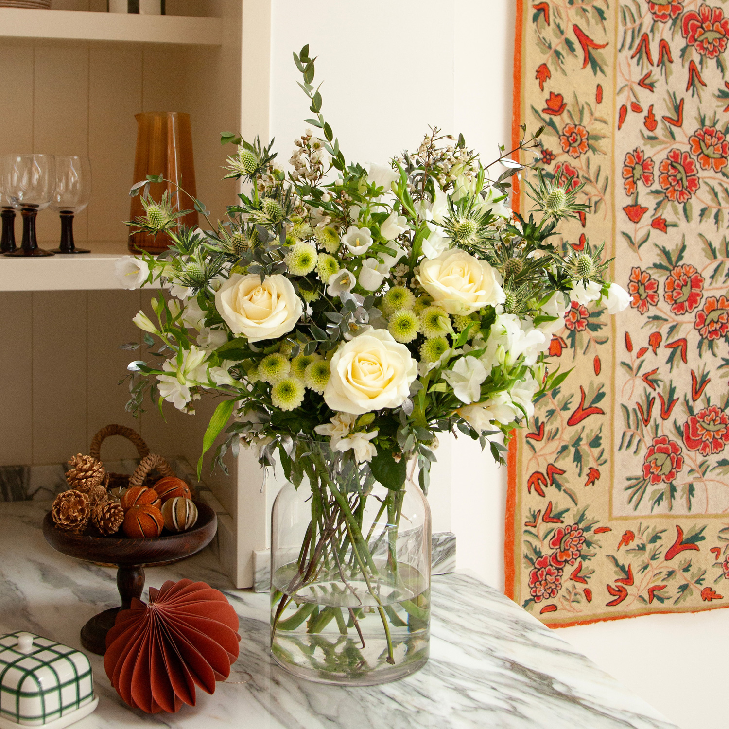 Christmas flower bouquet with white alstroemeria, freesia and roses | Send flowers online | Christmas Lights | size: showstopper image